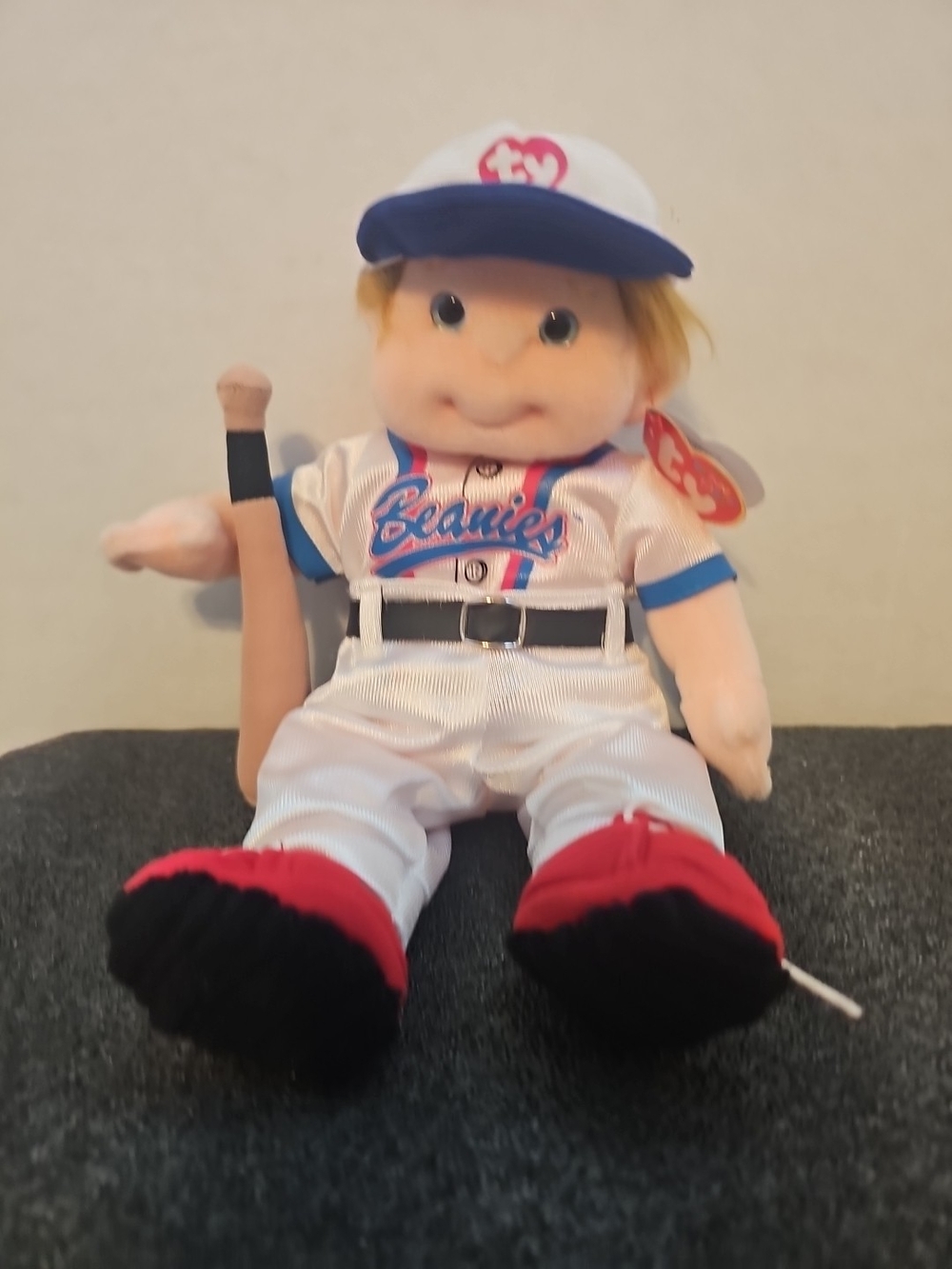 Vintage Ty Beanie Kids "Tumbles" baseball player doll wearing a white jersey